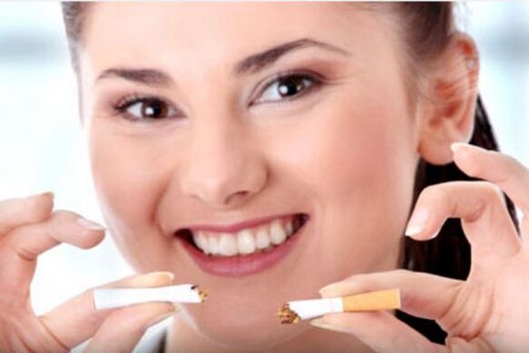 Girl holding a cigarette